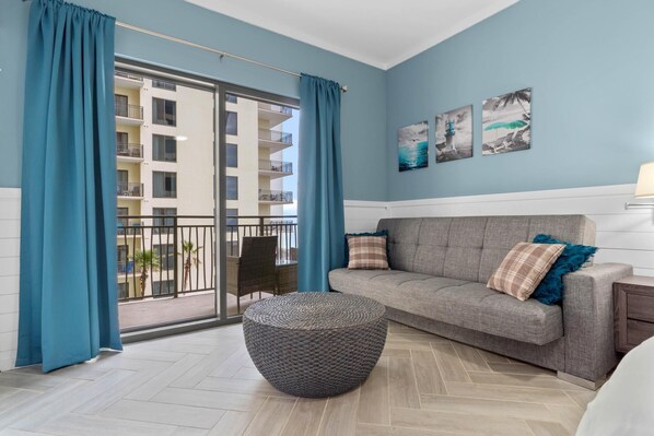 Living area with private balcony and stunning gulf views