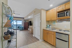 Kitchenette with microwave, sink and under counter refrigerator