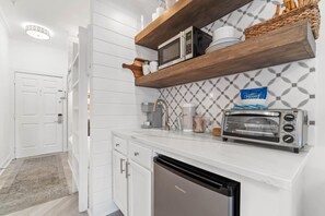 Kitchenette with microwave and under counter refrigerator