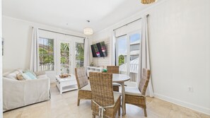 Open living area with dining table and stylish furnishings