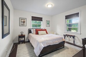 Primary bedroom with queen bed