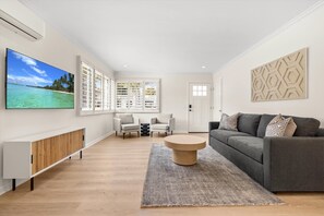 Living Room with SMART TV and Sofa Bed