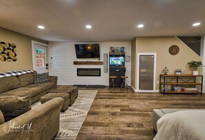 The lower level has board games, a party refrigerator so there are cold beverages always in reach, and ample room for everyone to be together.