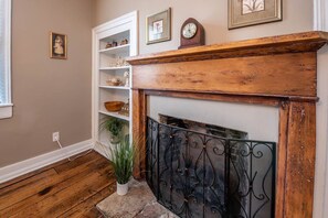 Experience the warmth of history in our Airbnb, complete with a beautifully preserved original hearth and hardwood floors.