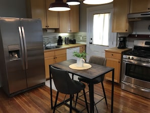 Dine in style after preparing a gourmet meal in our kitchen.