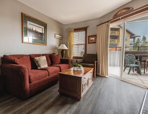 The sofa bed in the living room has sleeping capacity for two additional people.