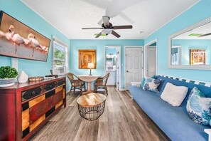 Chill and watch your favorite movie in this living  room.