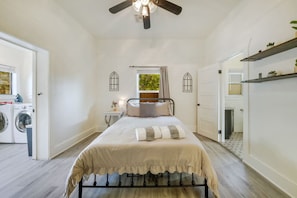 Bedroom 2 with queen-size bed, Jack and Jill bathroom, and laundry room access
