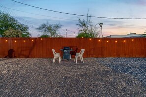 Backyard grill: Note that the backyard area is shared with casita guests. (The casita is also a short-term rental.)