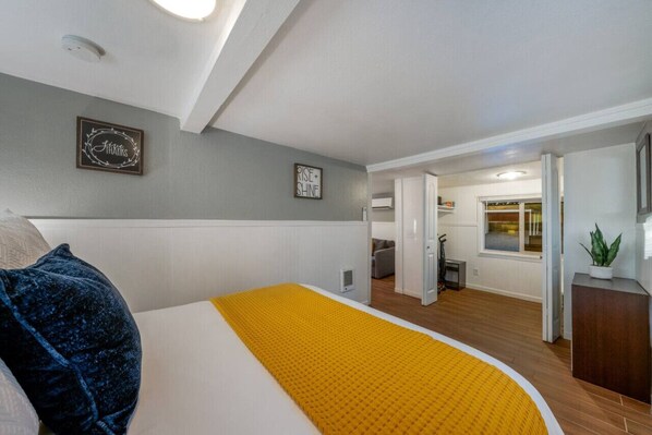 Bedroom with queen bed and large closet