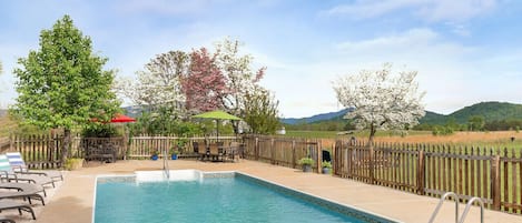 Boho Mountain is a 3BR in the Heart of Nelson County with a huge heated pool, hot tub, game room, and incredible mountain views!