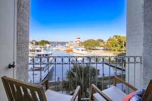 The private balcony is the perfect spot to enjoy your morning coffee and watch the yachts.