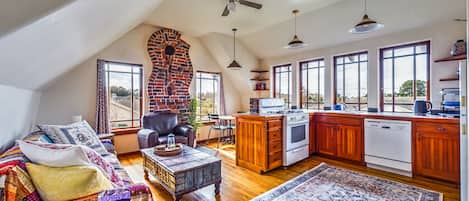 SkyDeck House 2nd Floor Crazy Wave Suite view of the main living area and Crazy Wave brickwork hearth!