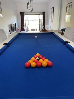 Full size pool table, coverts to dining table with 6 dining chairs 