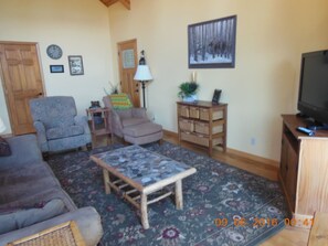 Cozy Living Area with Prow Front Windows