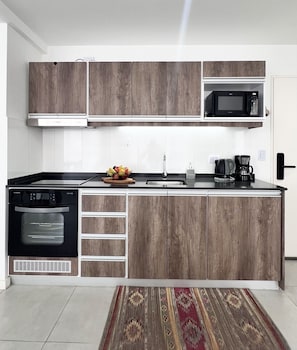 Full kitchen (appliances, glassware, pots & pans). Air purifier.