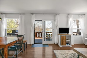 Dining room and living room over looking the lake