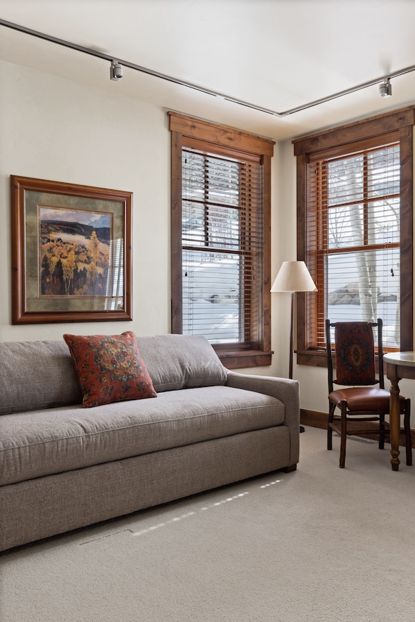 Living Room / Murphy Bedroom with Gas Fireplace