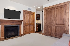 Living Room / Murphy Bedroom with Gas Fireplace