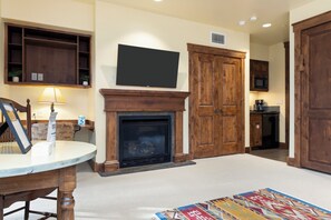 Living Room / Murphy Bedroom with Gas Fireplace