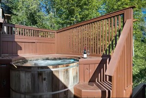 The redwood hot tub is separate from the pool so climb in and get warm!