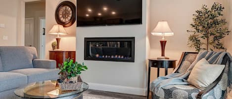 Living room with gas fireplace.