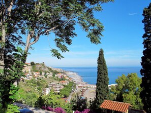 Sky, Plant, Building, Water, Cloud, Azure, Tree, Body Of Water, Vegetation, Coastal And Oceanic Landforms