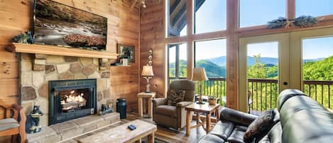 Cabin is flooded with light and impressive mountain views