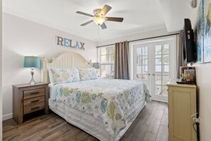 Relax in the Coastal Themed Master Bedroom with King Size Bed