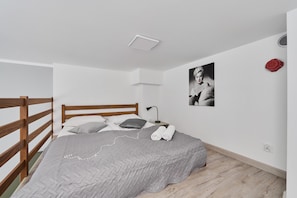 Comfortable double bed in the apartment.