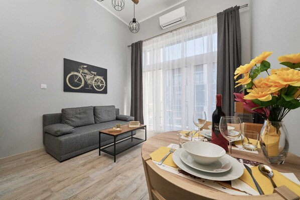 Large table with chairs for eating communal meals. 