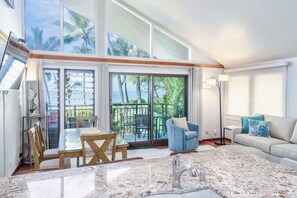 Soak in ocean views from our bright living & dining area! Your perfect coastal escape.