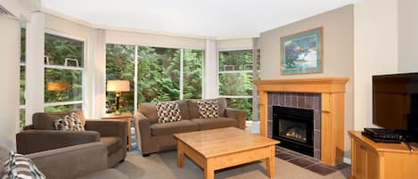 Find peace and relaxation with your close friends and family in this cozy living room.