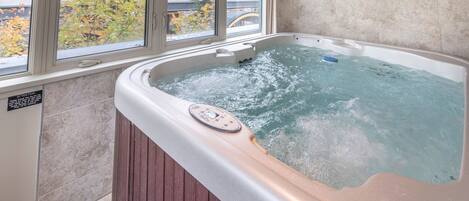 Relax and unwind in your very own private hot tub.