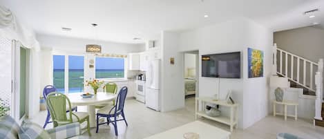Welcome to Jasmine Cottage! This two-story townhome features an open concept living area on the lower level with stunning ocean views.