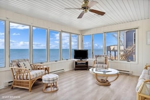 This cozy space offers the perfect spot to unwind and catch up on your favorite shows.