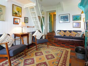 Living room | Yellow - Coastal Path Cottages, Trefor