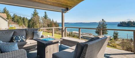 Enjoy sweeping views of Mount Rainier and Puget Sound from the oversized deck.