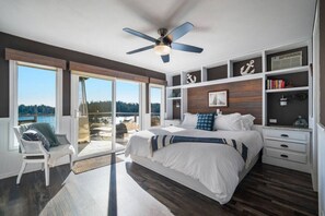 Wake up to breathtaking water views from the primary bedroom.  Room is equipped with air conditioning.