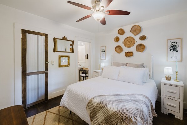 Our queen bed offers a rustic, charming embrace