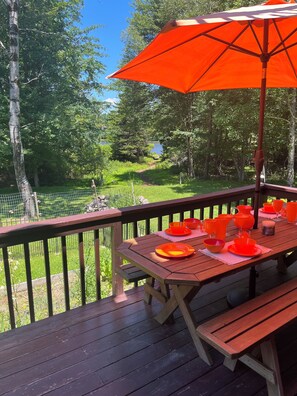 Deck on the first floor with lake view