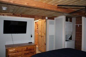 Entrance into bedroom with easy access to the washer and dryer!