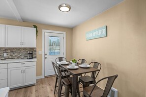 Formal dining in buffet style kitchen