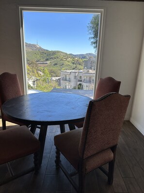 Dining room table with Hollywood Sign views 