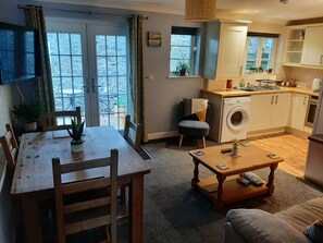 Open Plan Living Room With 49" TV
