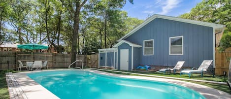 The Large Salt Water Pool, Umbrella Table for dining outdoors & Lounge Chairs for relaxing by the pool (Seasonal).