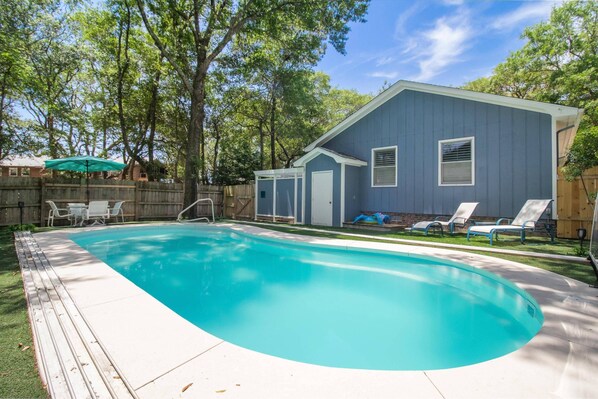 The Large Salt Water Pool, Umbrella Table for dining outdoors & Lounge Chairs for relaxing by the pool (Seasonal).