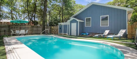Welcome to Blue Moon Beach Cottage! Enjoy your own private pool with lounge chairs for relaxing and soaking up the sun.