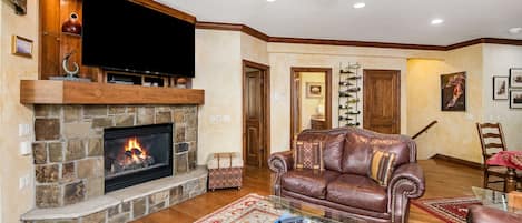 Living Room with Fireplace and TV