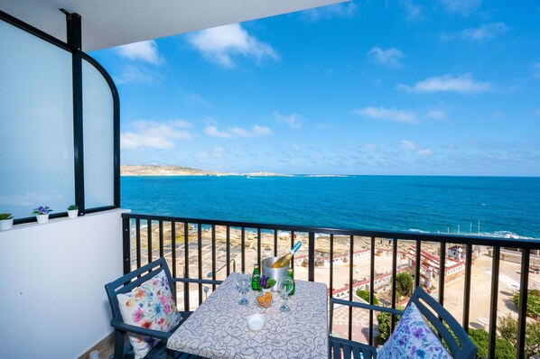Balcony with table and chairs